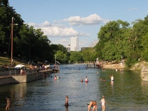 Barton Springs is a hot spot to cool off in Austin. Photo via Downtown Austin/Wikimedia Commons.
