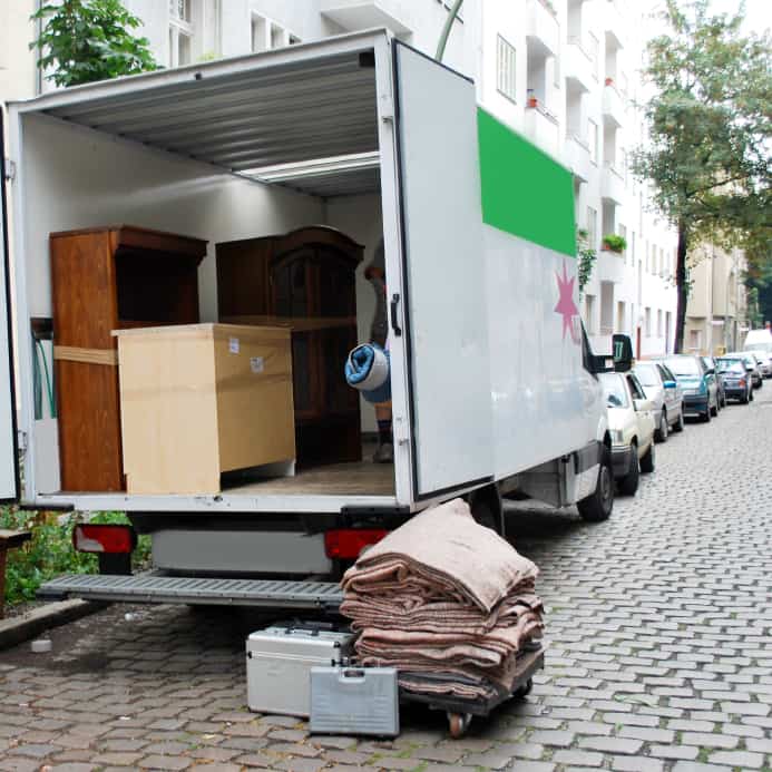 moving van with boxes and furniture