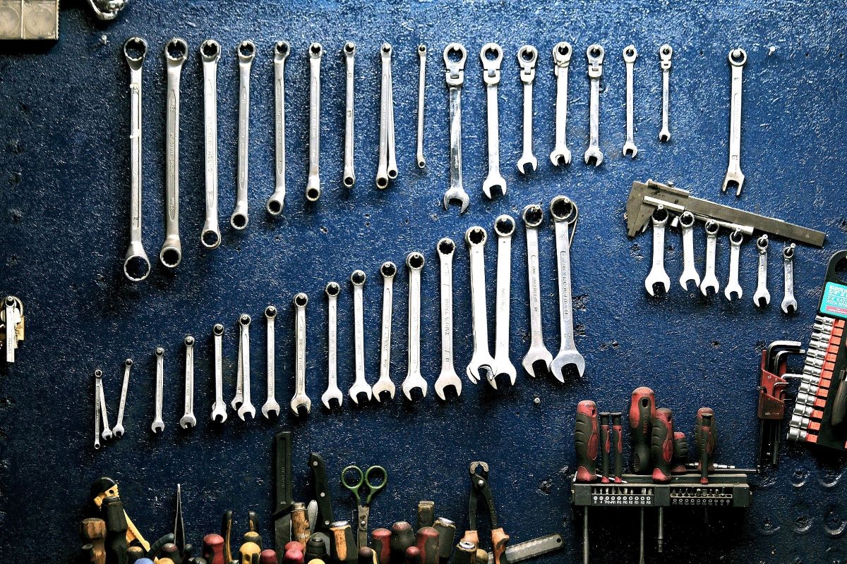 tools organized on a garage wall