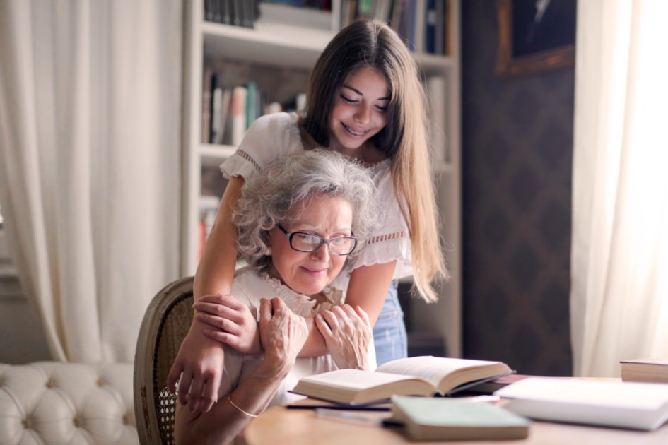 Grandma and granddaughter reading