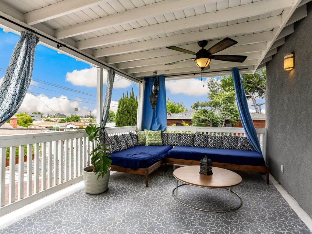 outdoor space on balcony set for an open house