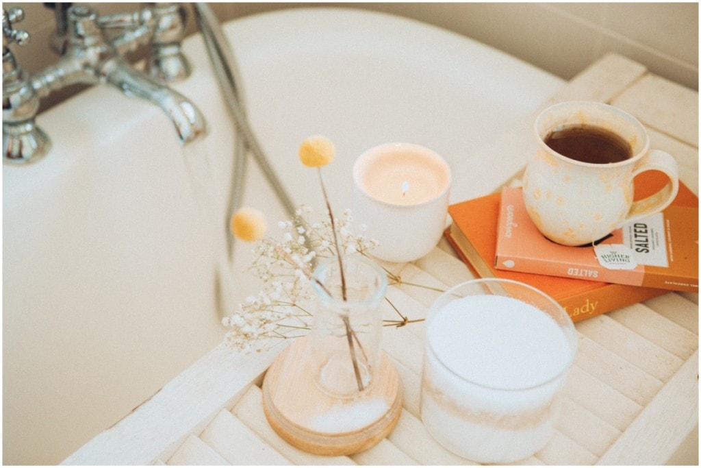 relaxing bath with books and candles