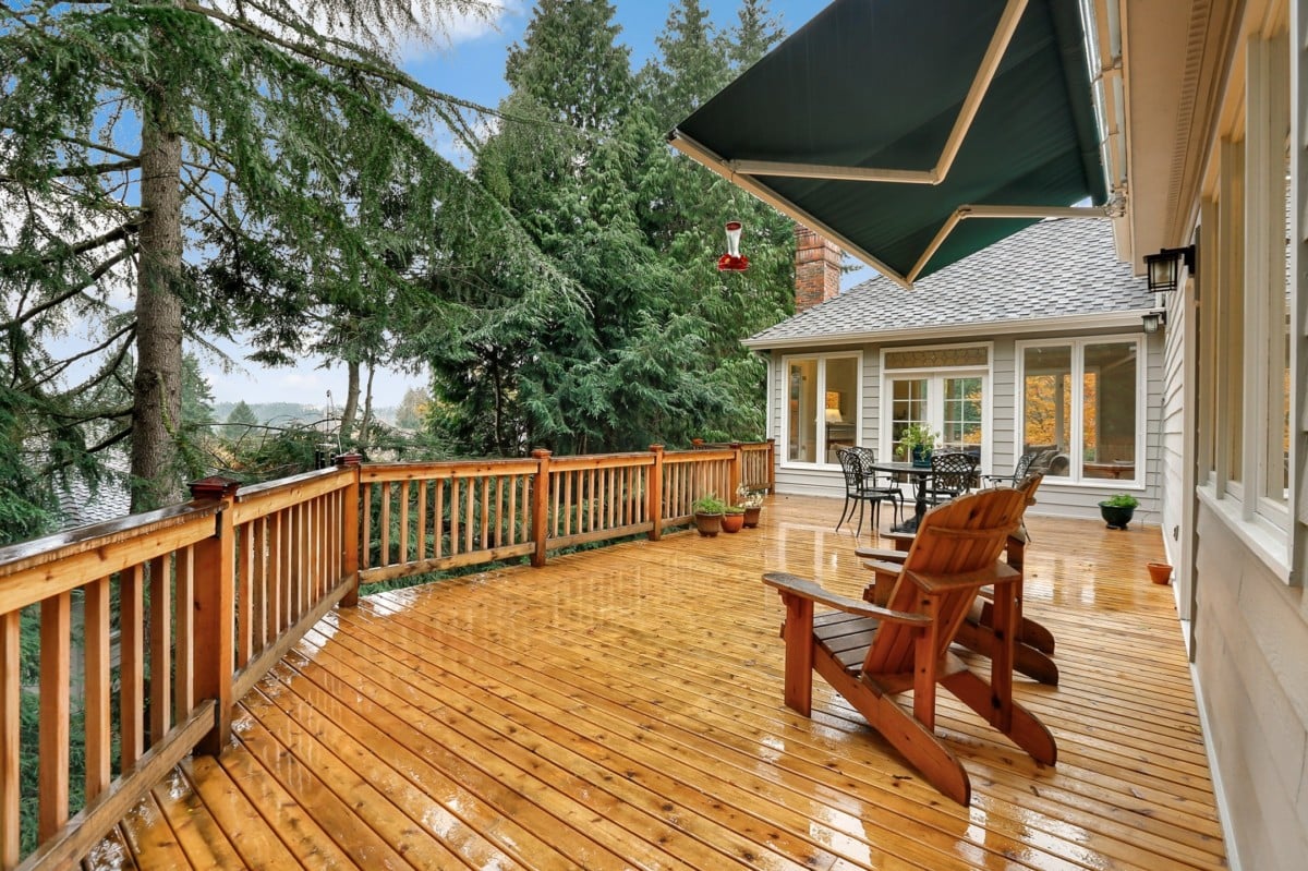 Large wood deck just after it rained