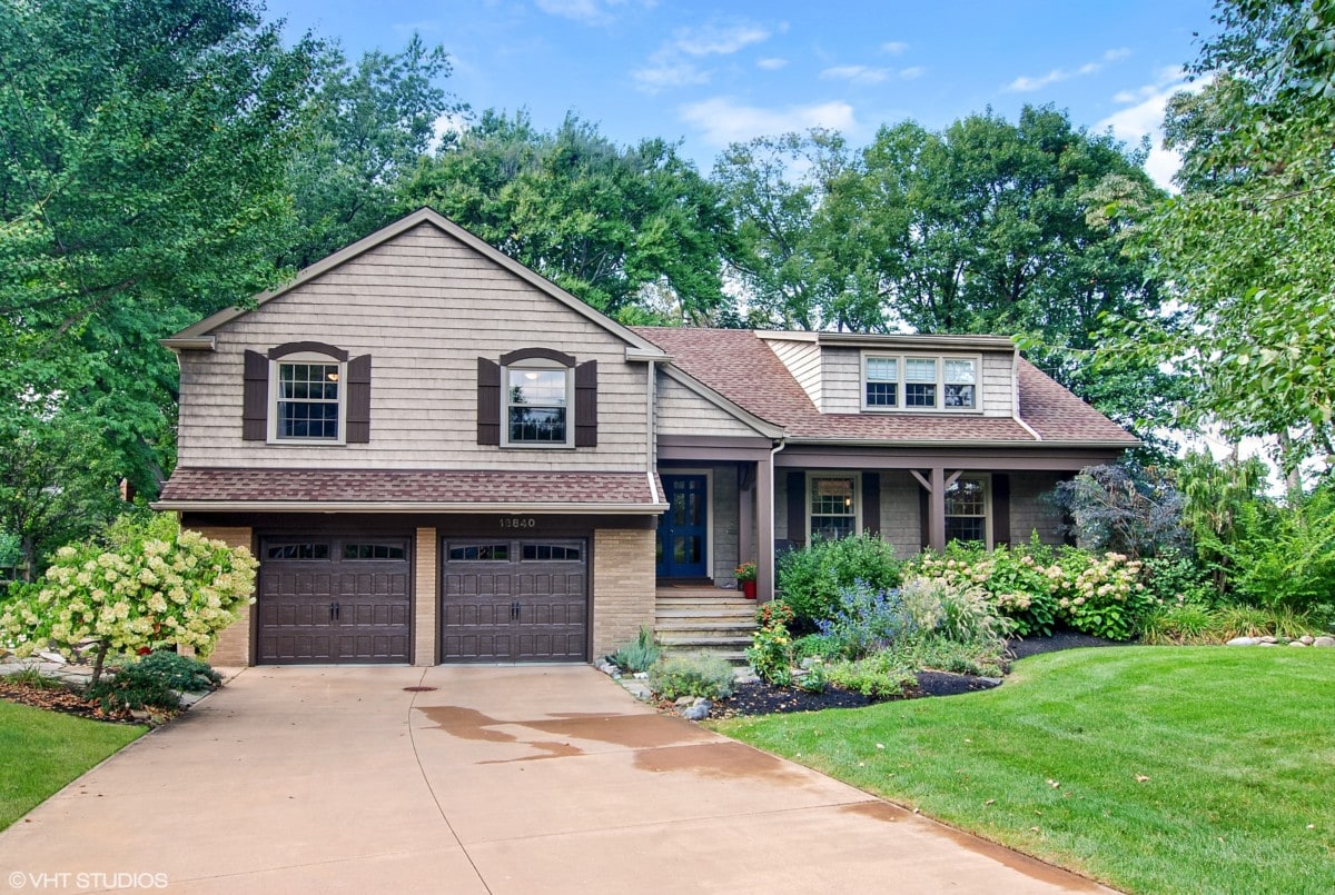 Brown house with a beautiful yard