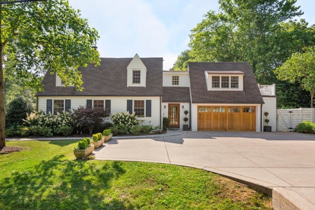 Beautiful one story rambler with wood garage door