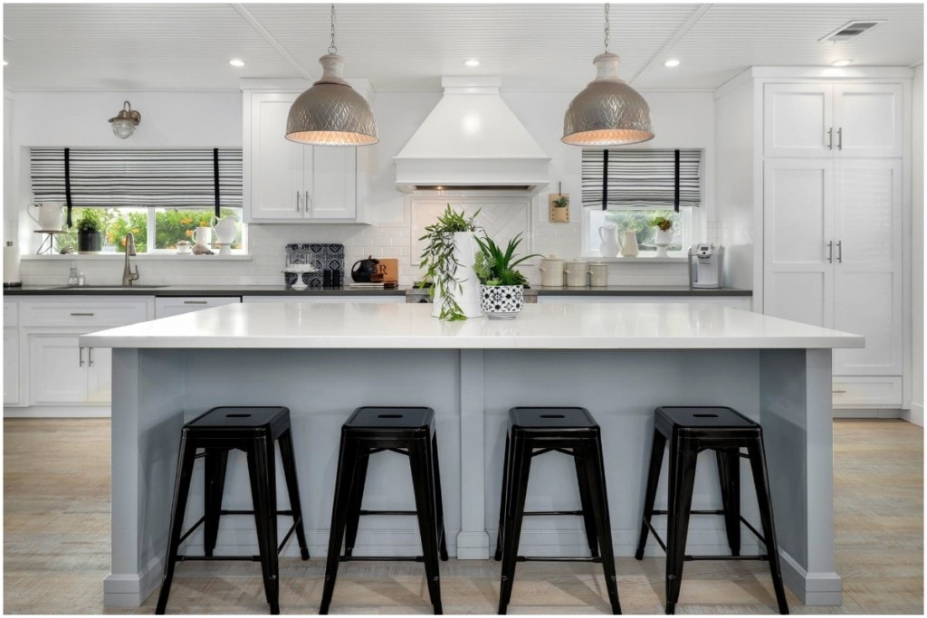 bright white kitchen with bar stools