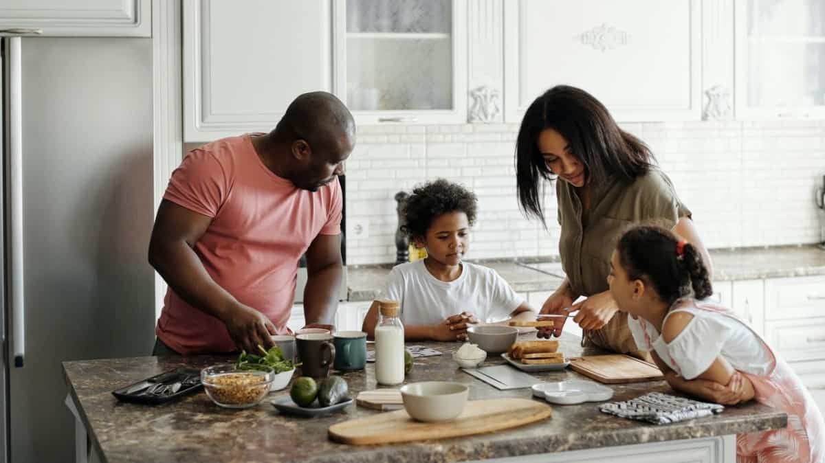 Family cooking together in the kitchen
