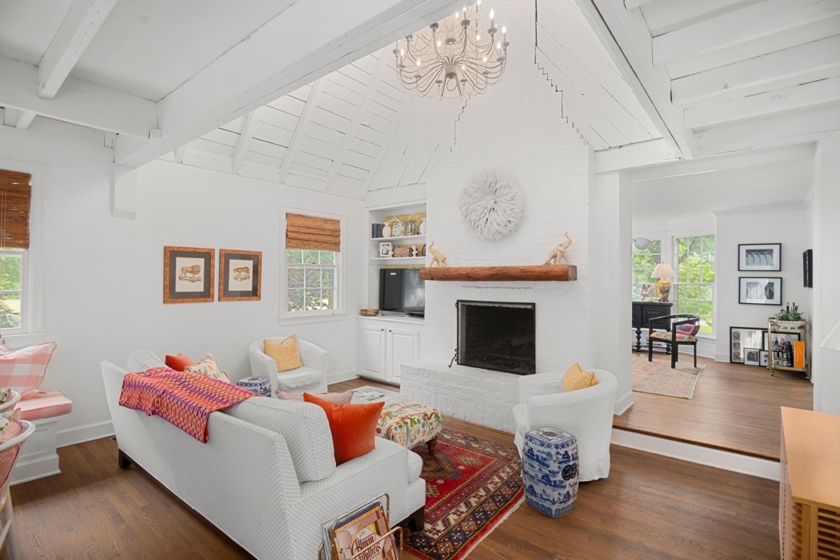 Living room with Persian rug and fireplace