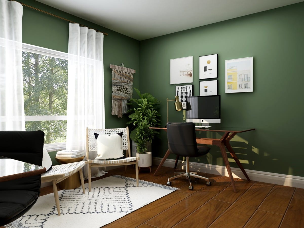 Home office with olive-colored walls and minimal artwork for a soothing workspace