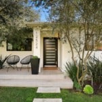 Thinking about downsizing your home? A single-story cream colored home like this one could suit you