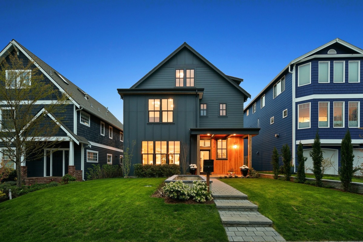 three-story house at dusk