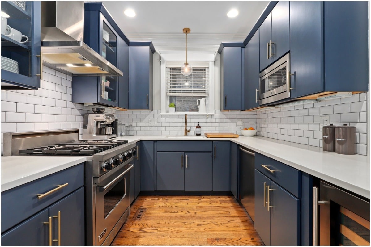 A Blue Kitchen with Gold Hardwear