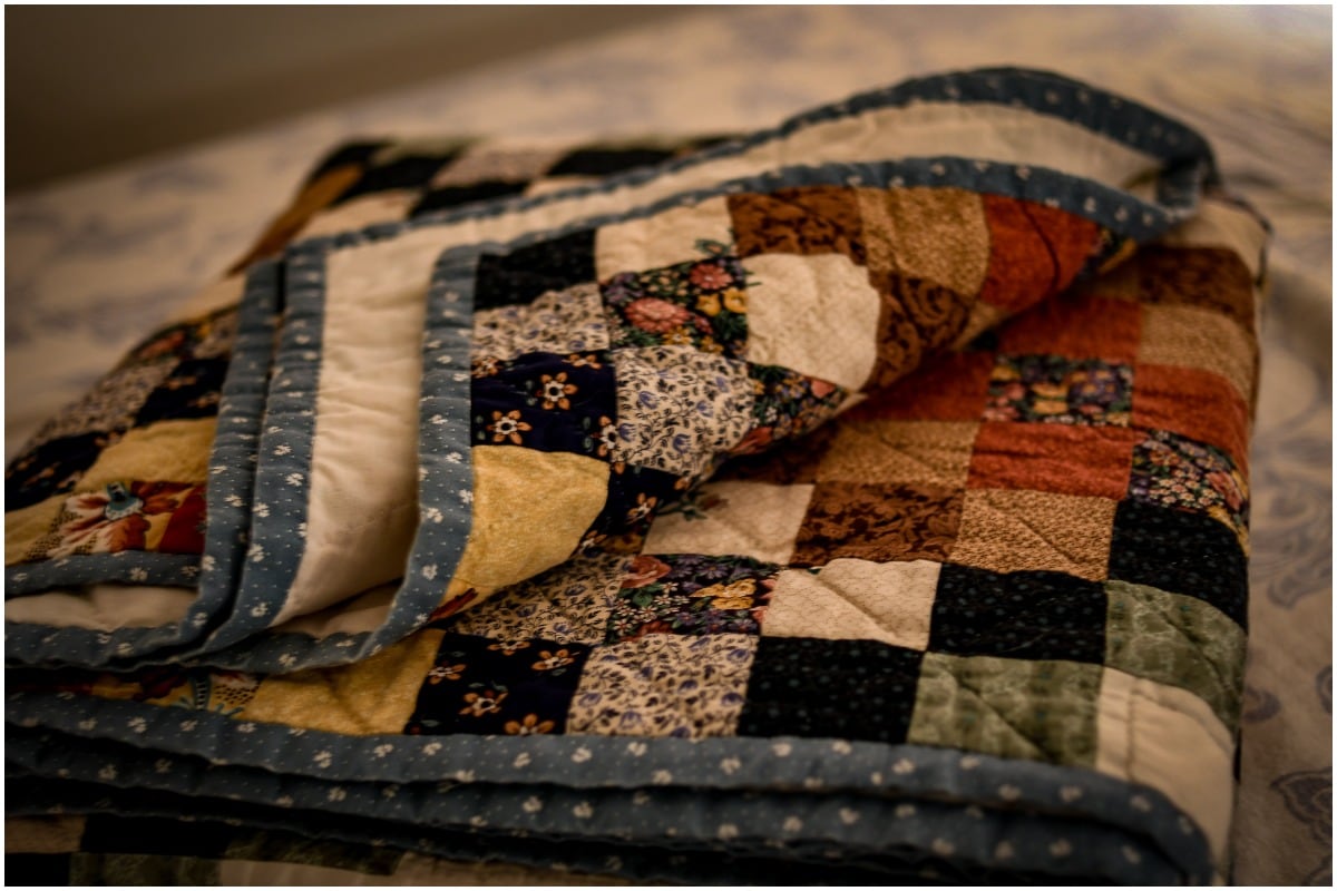 A quilt placed on a bed