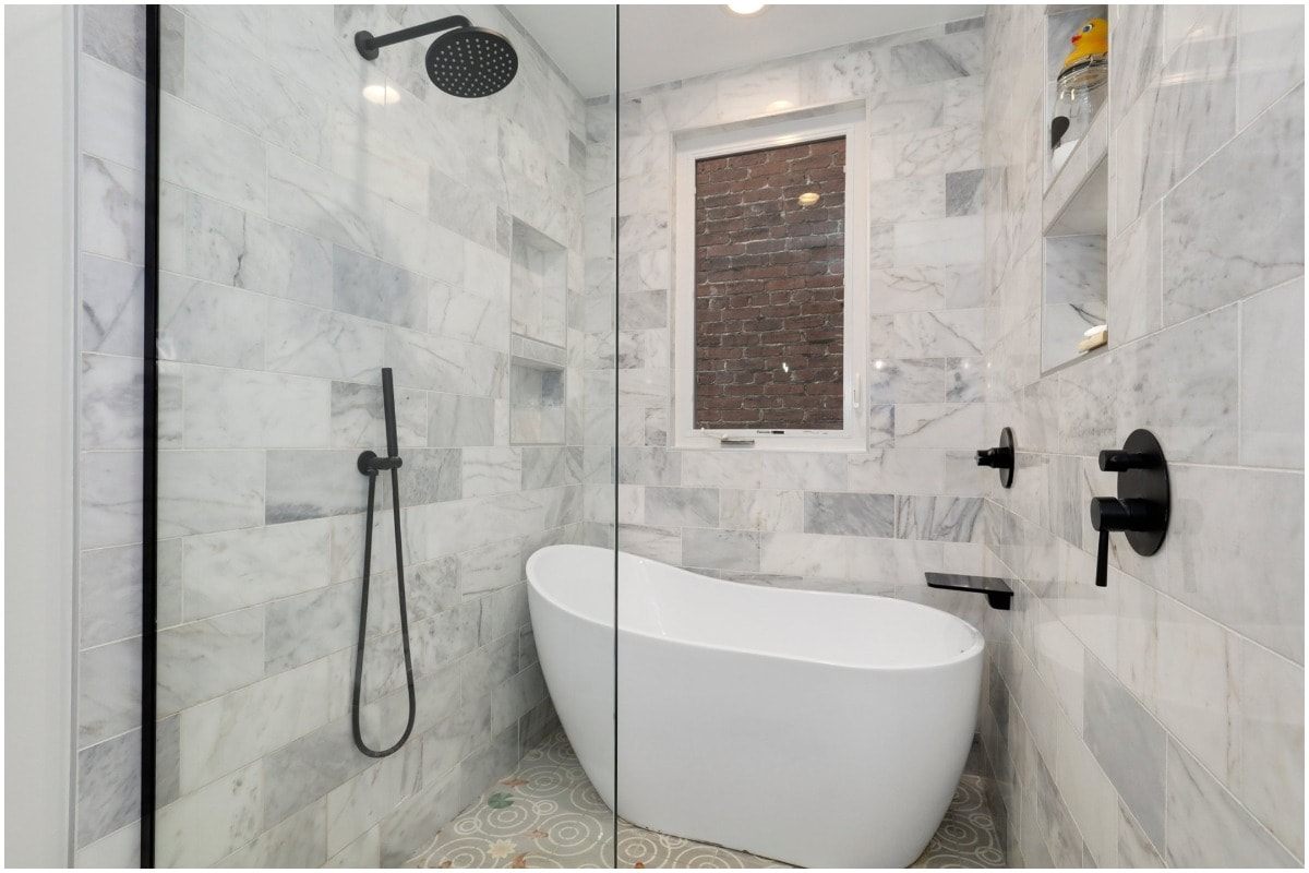 A freestanding tub and shower combo