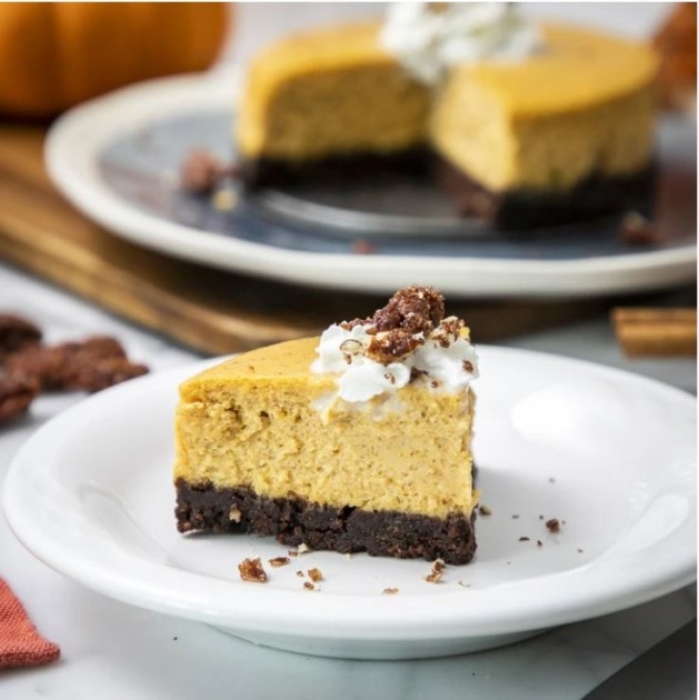 Pumpkin cheesecake with a cookie crust is perfect for Halloween at home