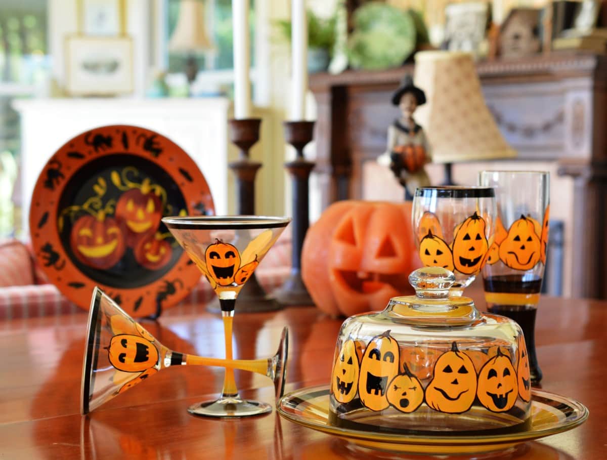 Pumpkins are always a classic. When it comes to Halloween decor, don't underestimate the power of pumpkins and black accents mixed with your everyday neutrals. Shop your home first to see if there is anything you could give a black spray paint makeover, then check your local Dollar Tree, HomeGoods, & Target for affordable seasonal accent pieces. That's where I found everything pictured in this spooktacular tablescape, which I combined with my existing table runner, placemats, china, & cloth napkins. - Jennifer Digiacomo, Pixels And Pop