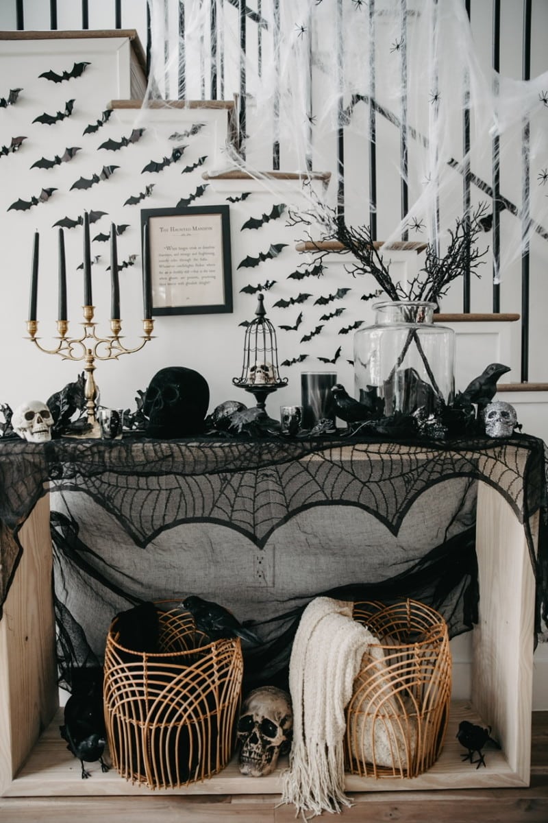 entryway-with-spiderweb-decor-and-bats