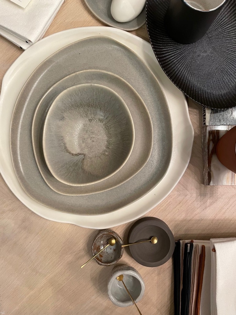 gray bowls and charcoal accessories on the table