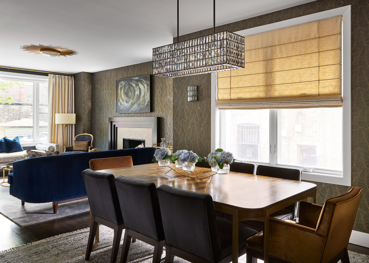 warm colored dining room with crystal chandelier