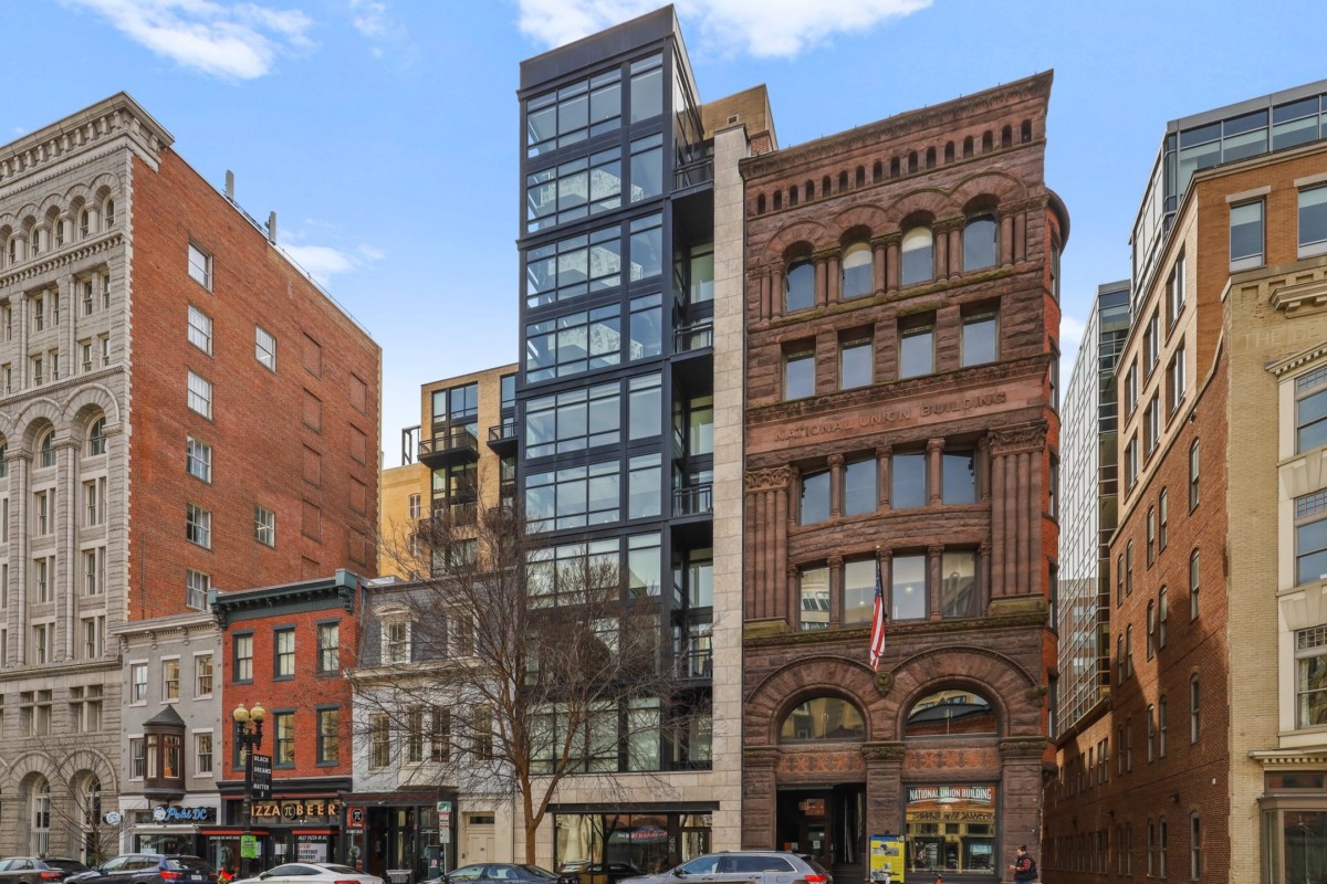 different row homes with romanesque style on the right side