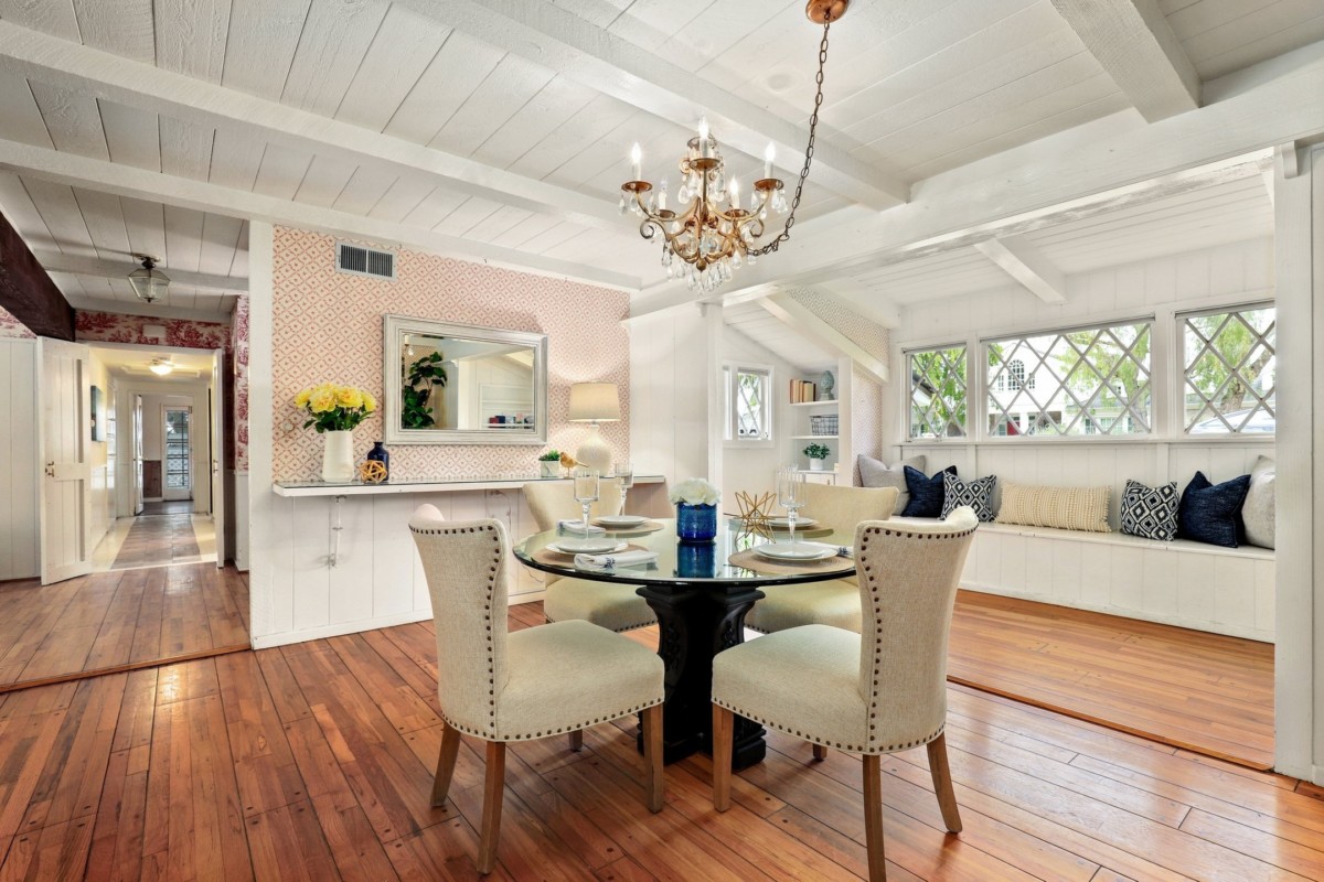 kitchen dining room combo with chandelier as the lighting