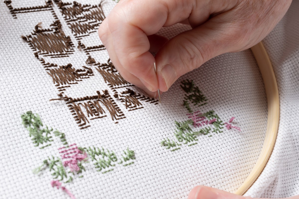 Person working on an embroidery project