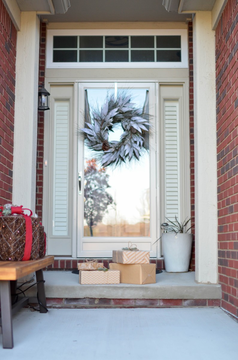 brick home wreath on door 