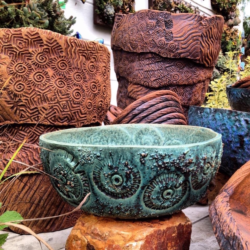 ceramic pottery pots in various colors