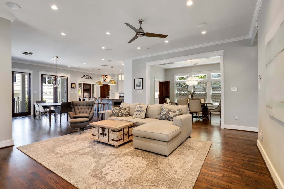 neutral open concept home design with a rug in the middle