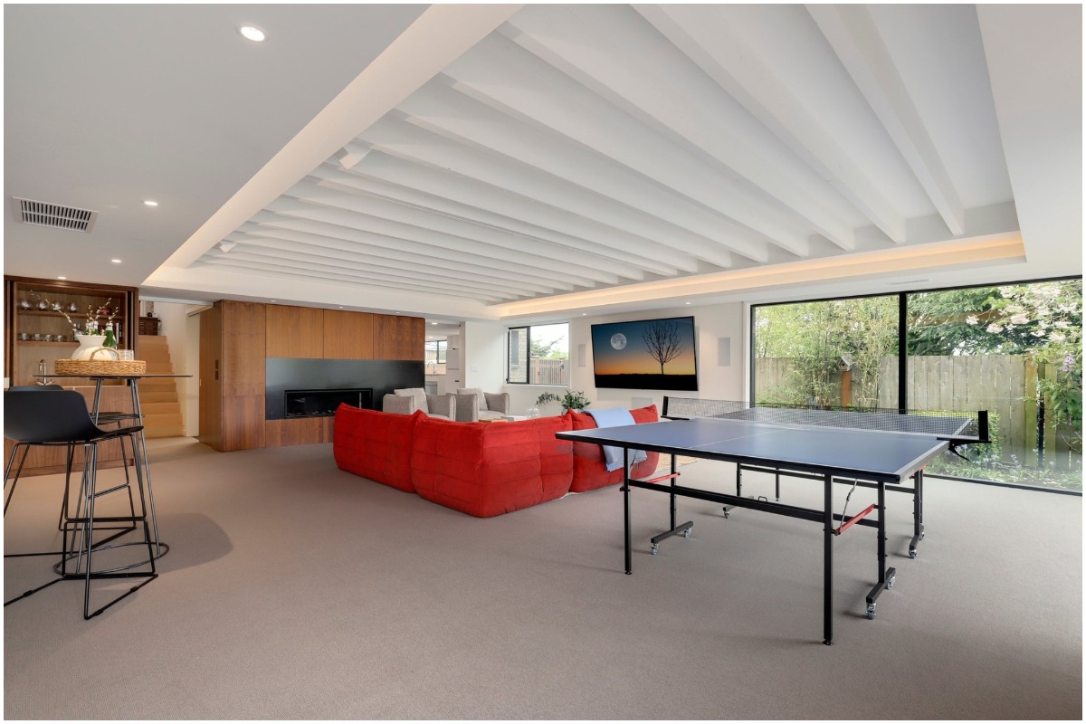 Finished basement with ping pong table