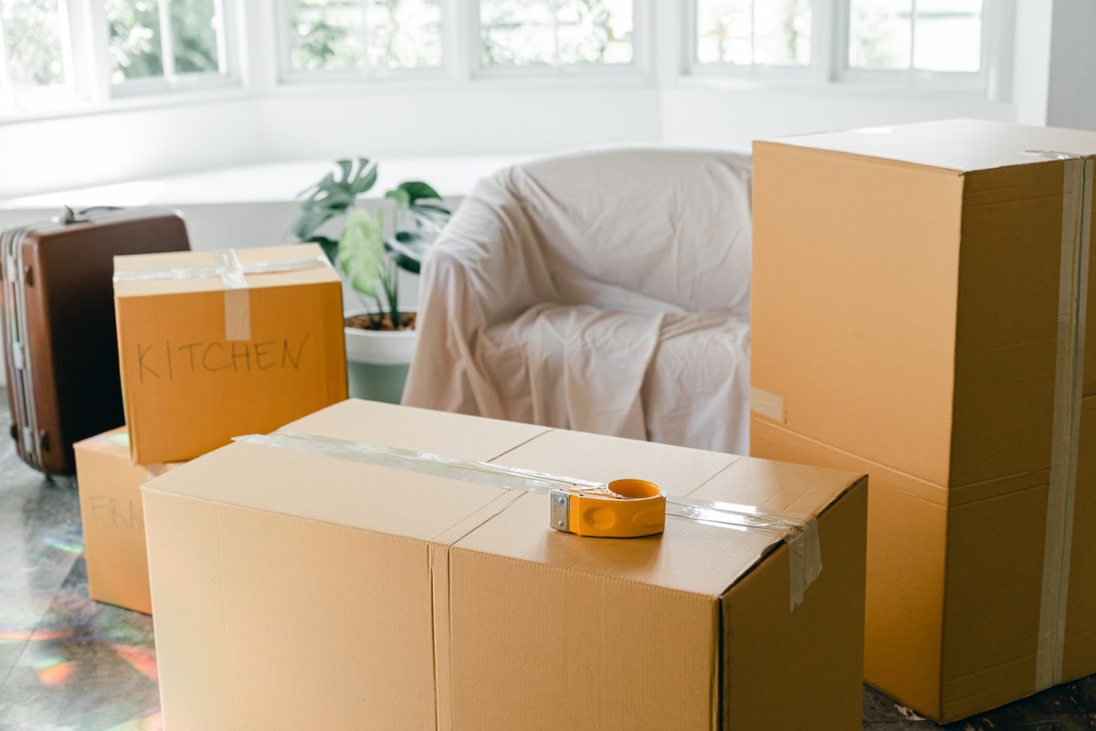 moving boxes on living room floor