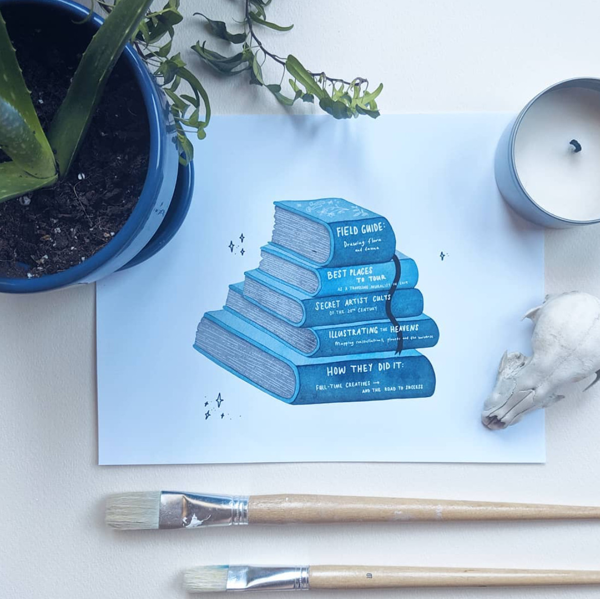 drawing of blue books on a table