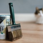 paint brush and can that contains some volatile organic compounds in the paint