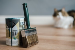 paint brush and can that contains some volatile organic compounds in the paint