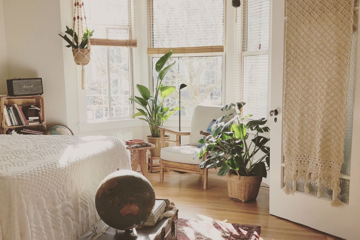 clean apartment bedroom with plants