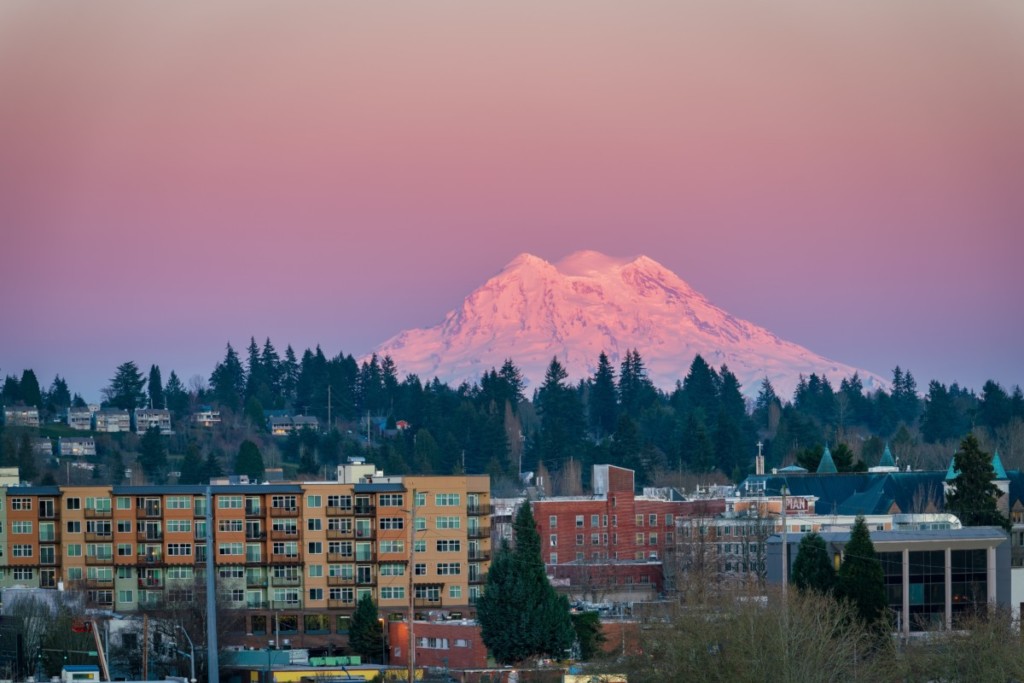 view of olympia washington with mount rainier in the background at sunset