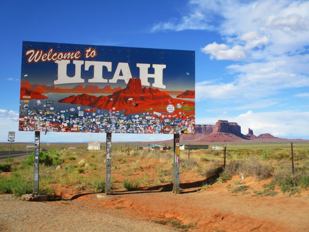 utah welcome sign along highway on sunny day 