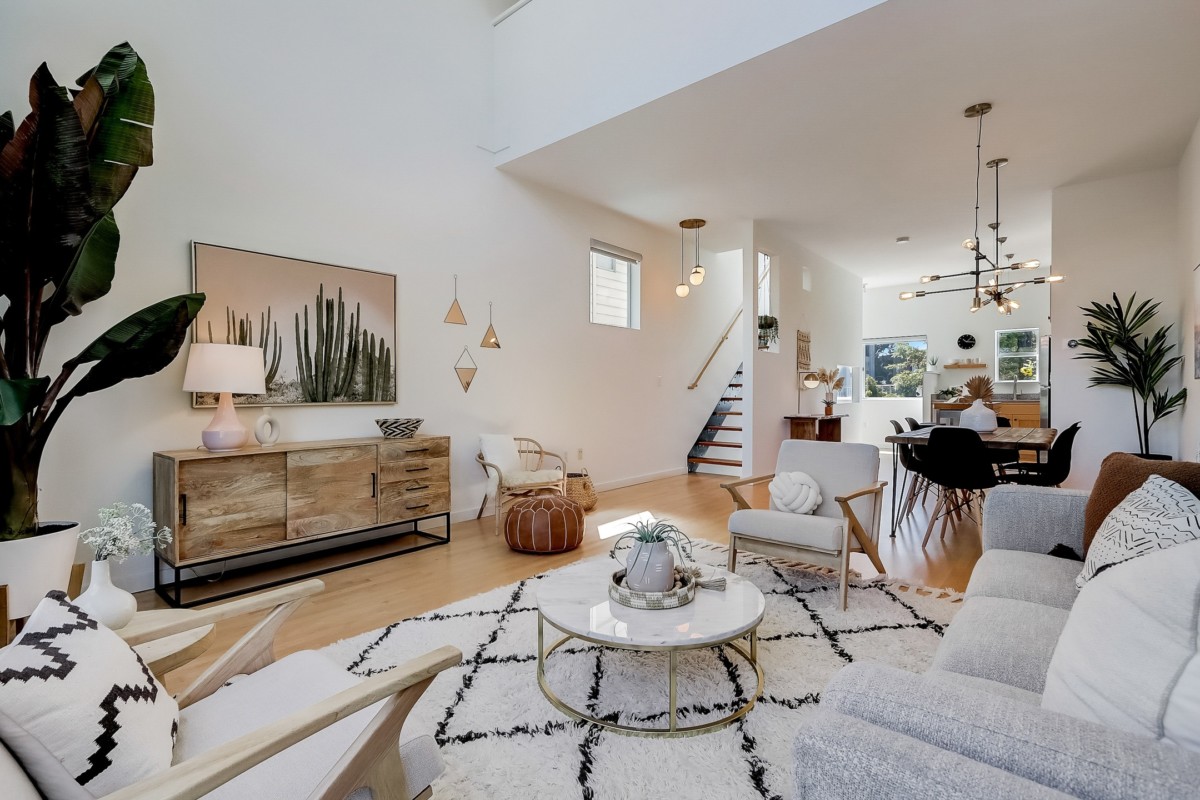 living room with rustic design, neutral colors, and wood finishes