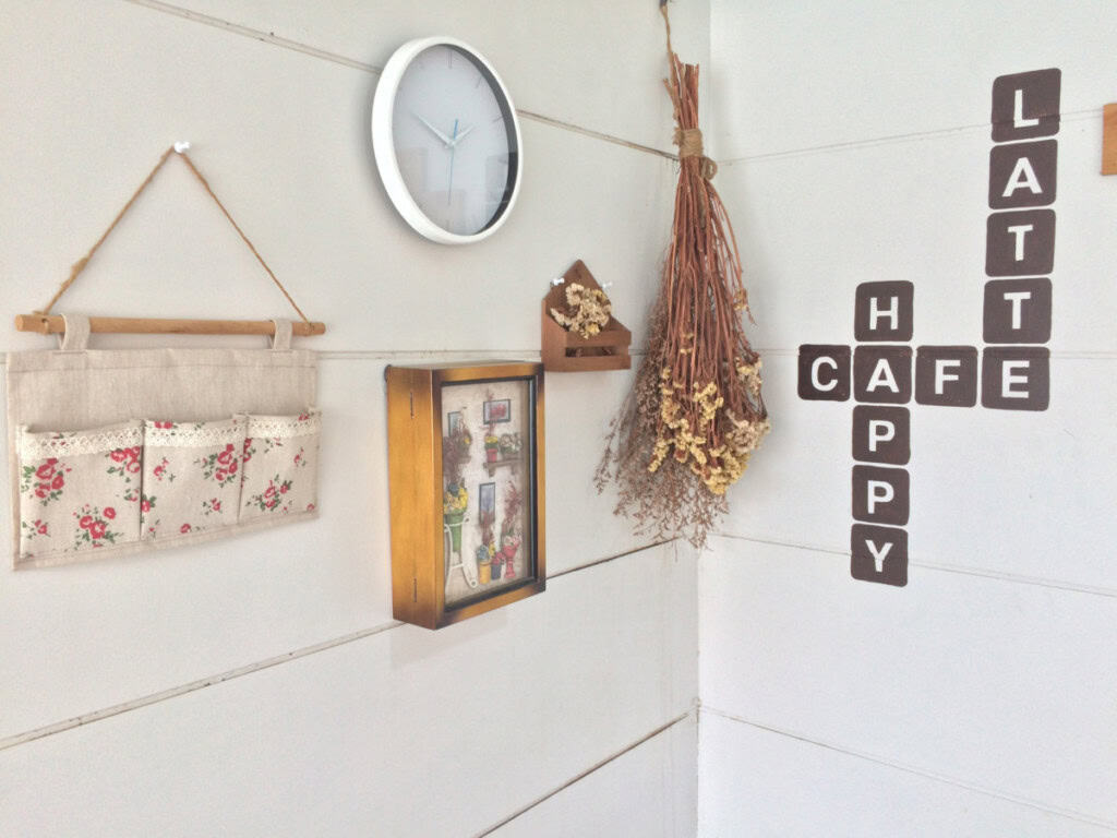 Removable wall decals placed decoratively in the corner of an apartment kitchen