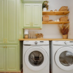 A washer and dryer combo in a dedicated laundry room of an apartment