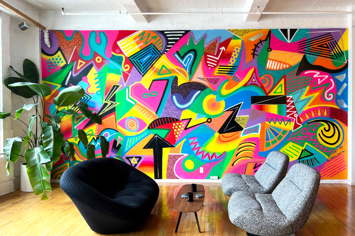 An abstract mural in a living room