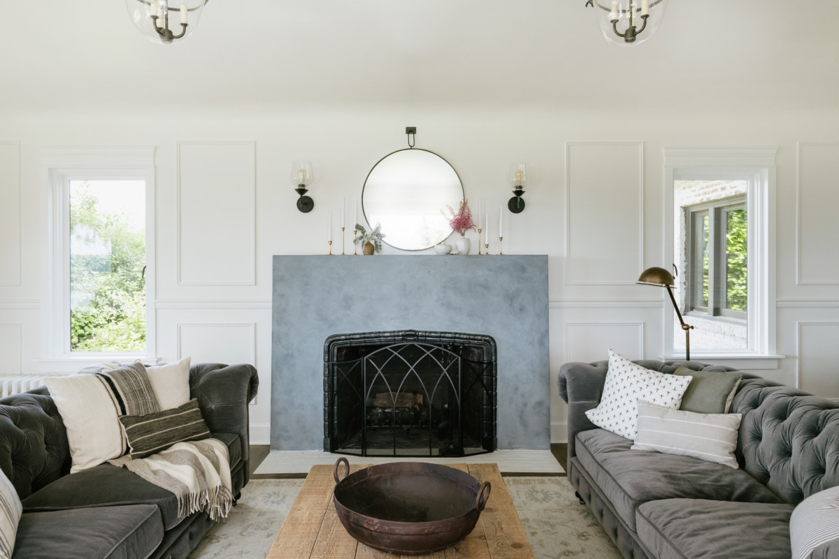 Bright living room with a blue fire mantel