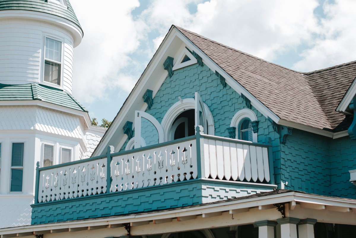 finest examples of gothic revival roof with blue and white exterior