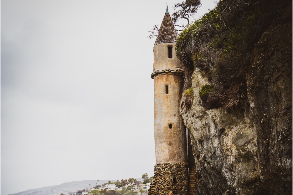 A tower next to a cliff