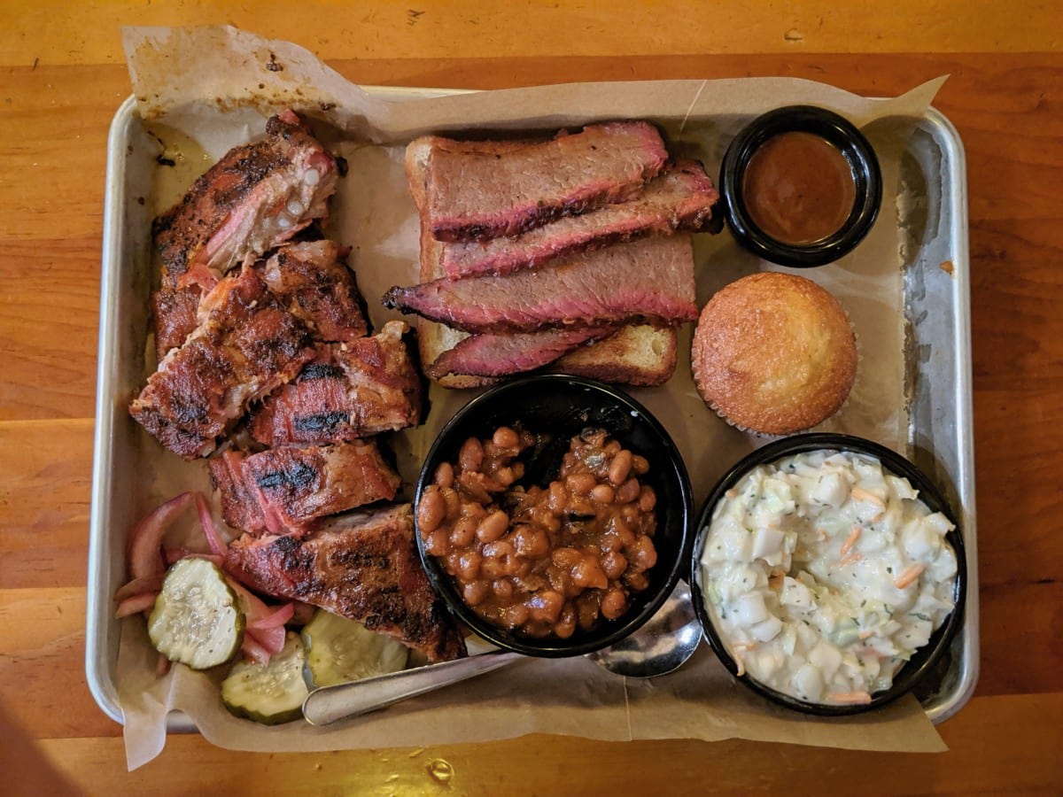 bbq plate with brisket, beans, and slaw