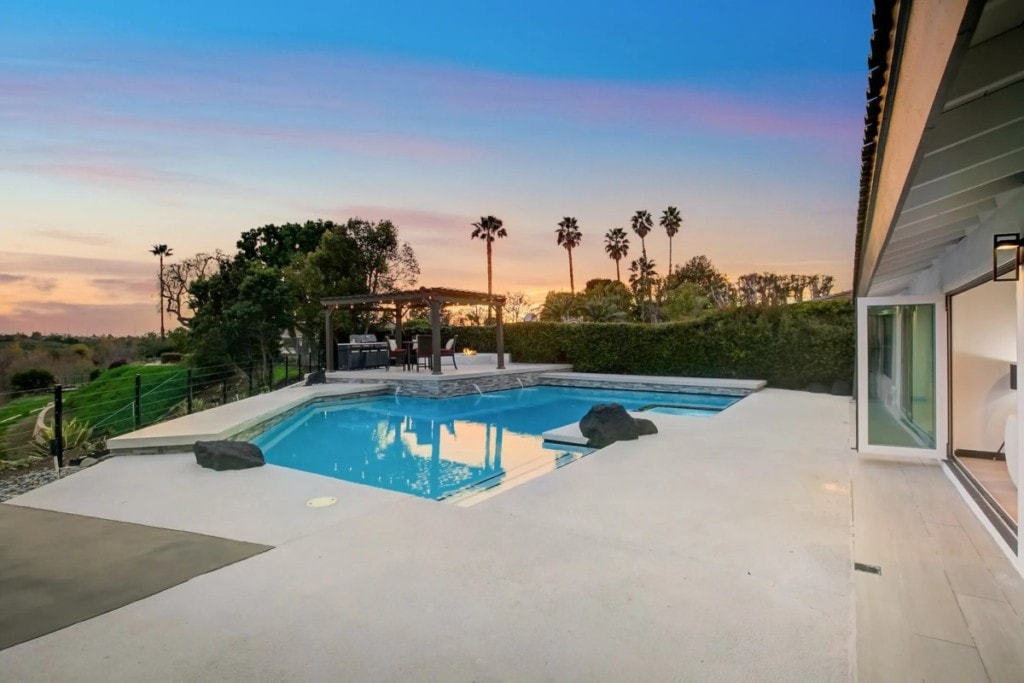 pool in villa park mansion during sunset
