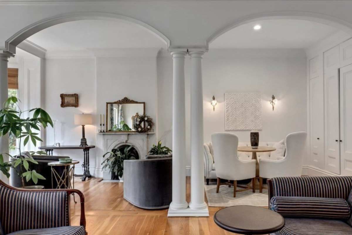 A living room framed by archways