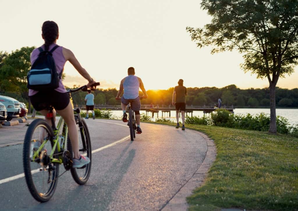 People riding bikes at a park