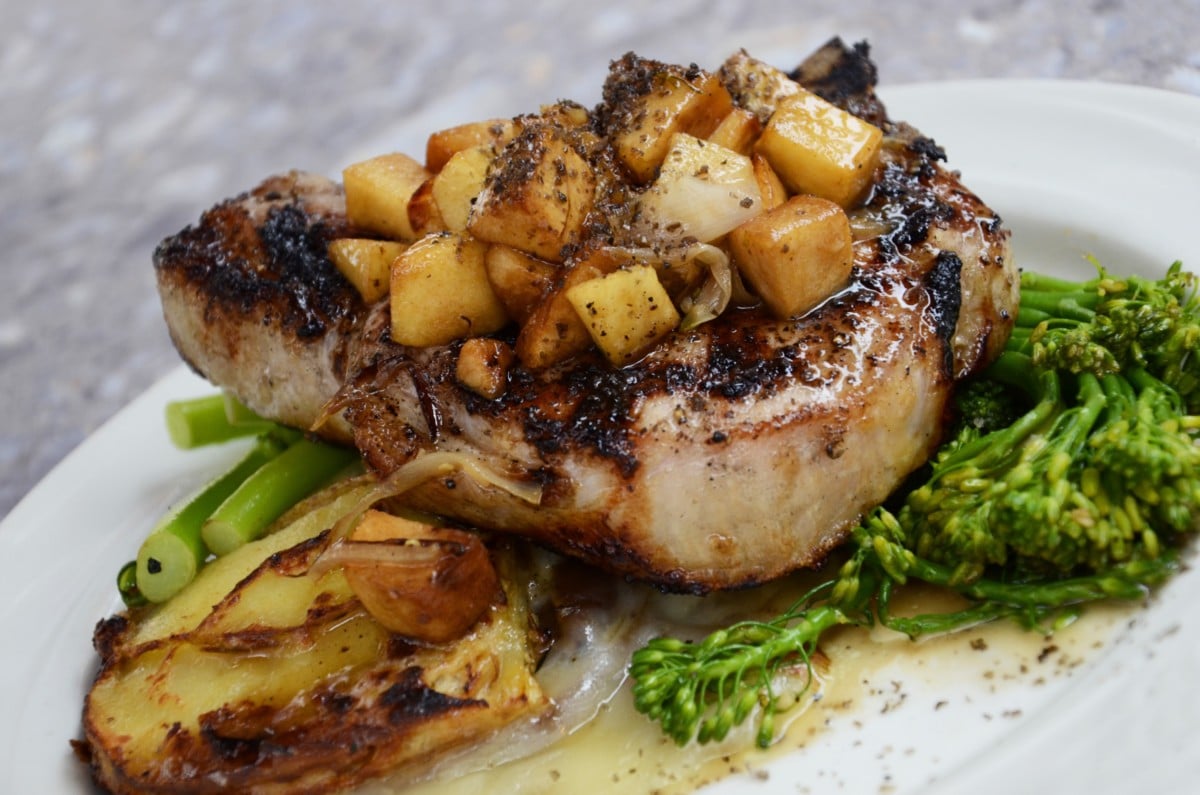 pork chop with sauteed apples and broccolini