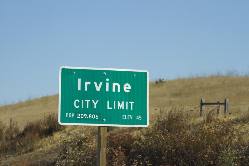 A road sign for Irvine city limit in Southern California.